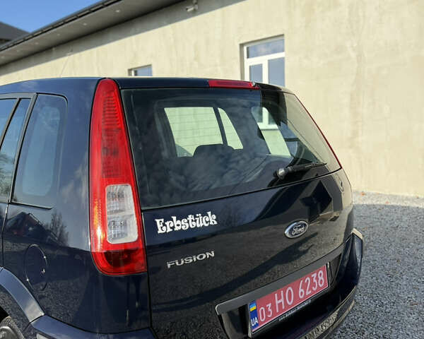 Синій Форд Фьюжен, об'ємом двигуна 1.4 л та пробігом 188 тис. км за 4900 $, фото 15 на Automoto.ua