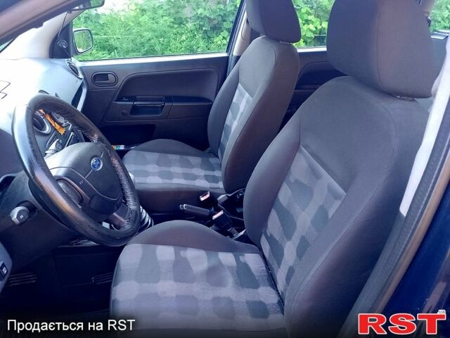 Синий Форд Фьюжн, объемом двигателя 1.2 л и пробегом 252 тыс. км за 4200 $, фото 7 на Automoto.ua