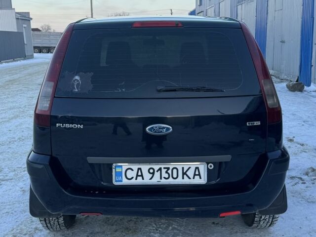 Синій Форд Фьюжен, об'ємом двигуна 1.4 л та пробігом 269 тис. км за 4900 $, фото 5 на Automoto.ua