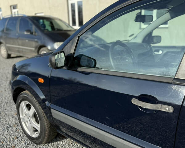 Синій Форд Фьюжен, об'ємом двигуна 1.4 л та пробігом 188 тис. км за 4900 $, фото 62 на Automoto.ua