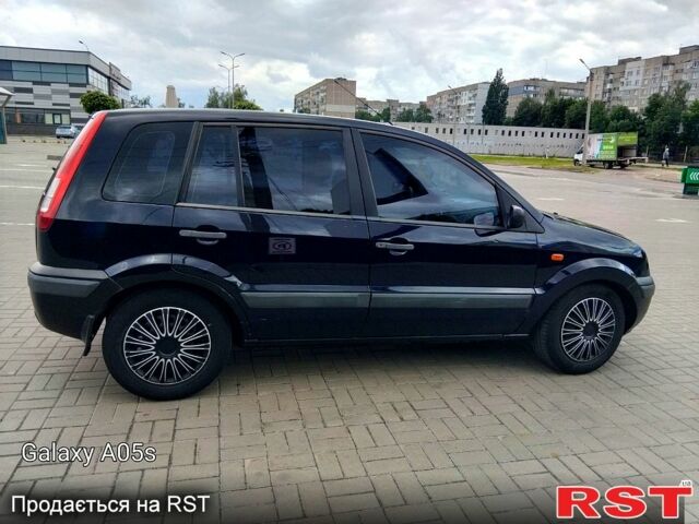 Синій Форд Фьюжен, об'ємом двигуна 1.2 л та пробігом 283 тис. км за 3500 $, фото 7 на Automoto.ua