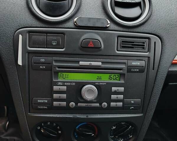 Синий Форд Фьюжн, объемом двигателя 1.39 л и пробегом 318 тыс. км за 3800 $, фото 6 на Automoto.ua