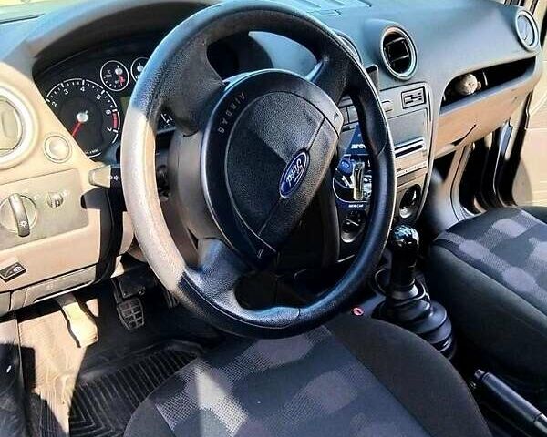Синий Форд Фьюжн, объемом двигателя 1.2 л и пробегом 283 тыс. км за 3500 $, фото 4 на Automoto.ua