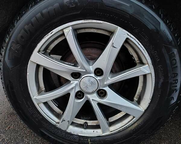 Синий Форд Фьюжн, объемом двигателя 1.39 л и пробегом 318 тыс. км за 3800 $, фото 9 на Automoto.ua