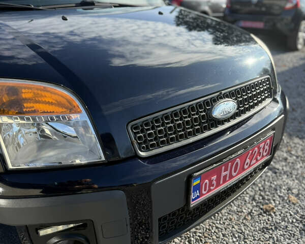 Синій Форд Фьюжен, об'ємом двигуна 1.4 л та пробігом 188 тис. км за 4900 $, фото 75 на Automoto.ua