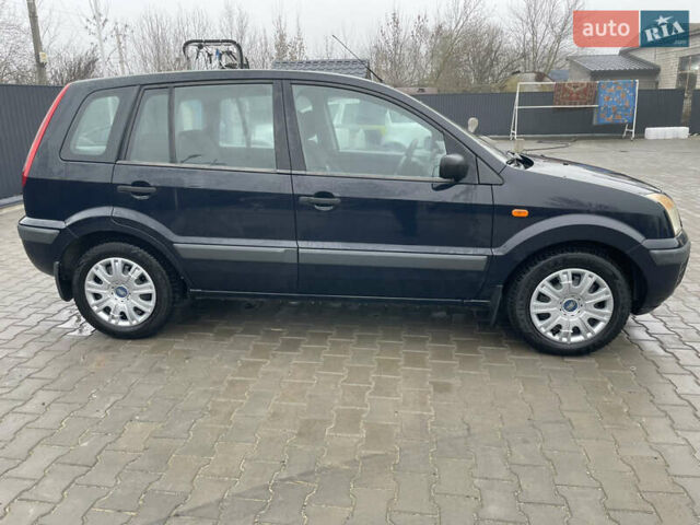 Синий Форд Фьюжн, объемом двигателя 1.4 л и пробегом 220 тыс. км за 4300 $, фото 5 на Automoto.ua