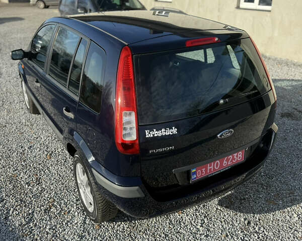 Синій Форд Фьюжен, об'ємом двигуна 1.4 л та пробігом 188 тис. км за 4900 $, фото 71 на Automoto.ua