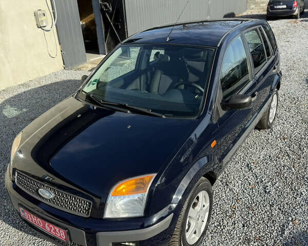 Синій Форд Фьюжен, об'ємом двигуна 1.4 л та пробігом 188 тис. км за 4900 $, фото 72 на Automoto.ua