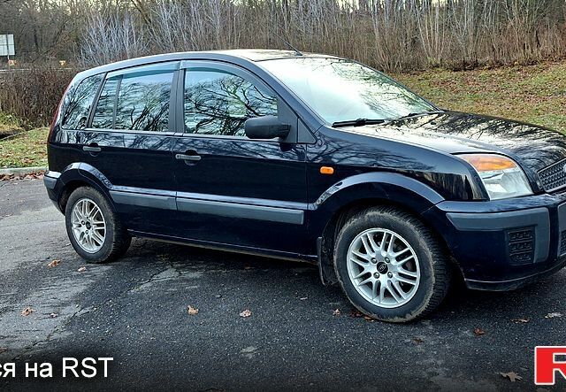 Синий Форд Фьюжн, объемом двигателя 1.2 л и пробегом 235 тыс. км за 3950 $, фото 6 на Automoto.ua