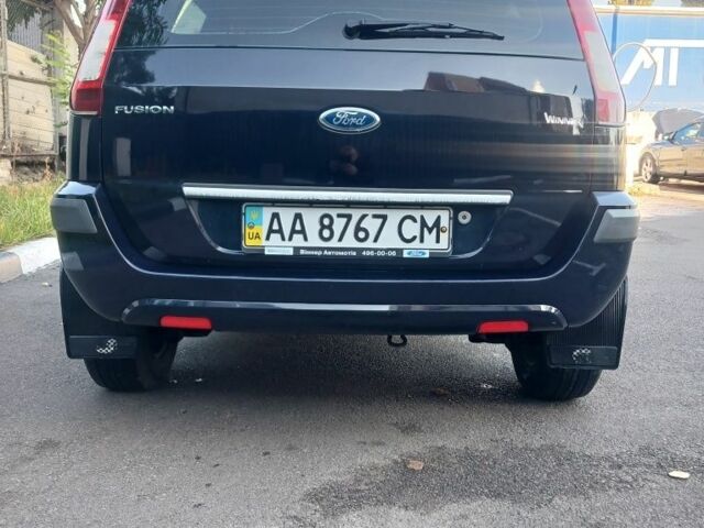 Синий Форд Фьюжн, объемом двигателя 1.25 л и пробегом 123 тыс. км за 5300 $, фото 4 на Automoto.ua