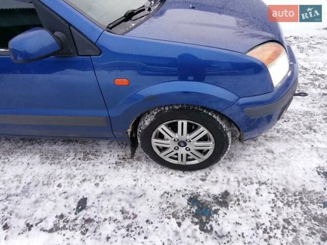 Синий Форд Фьюжн, объемом двигателя 1.4 л и пробегом 135 тыс. км за 5100 $, фото 10 на Automoto.ua