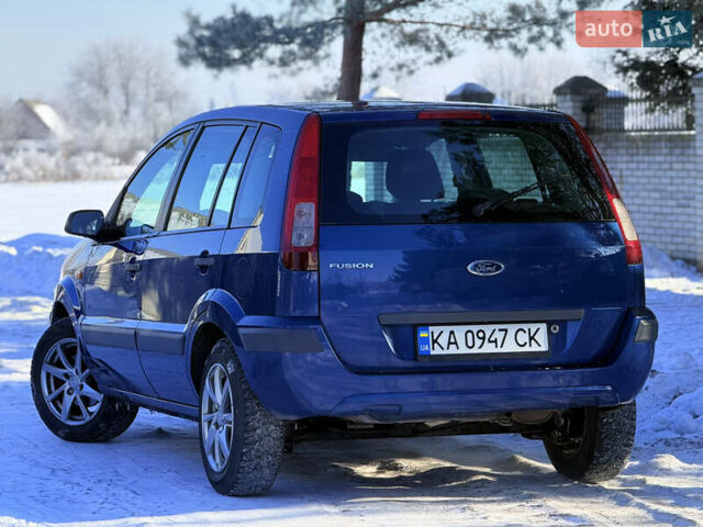 Синий Форд Фьюжн, объемом двигателя 1.4 л и пробегом 318 тыс. км за 4400 $, фото 11 на Automoto.ua