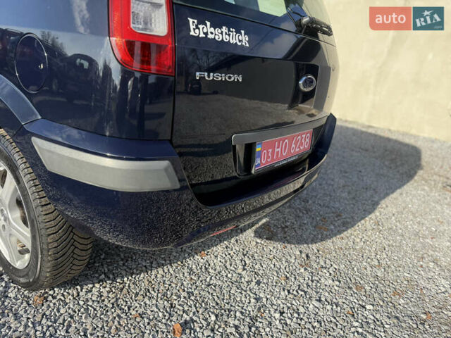 Синій Форд Фьюжен, об'ємом двигуна 1.4 л та пробігом 188 тис. км за 4900 $, фото 69 на Automoto.ua