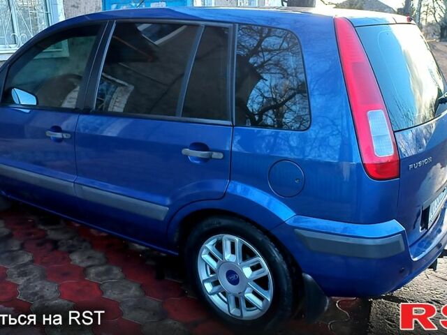 Синій Форд Фьюжен, об'ємом двигуна 1.4 л та пробігом 106 тис. км за 6150 $, фото 4 на Automoto.ua