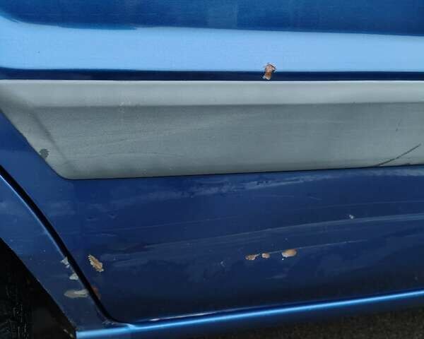 Синий Форд Фьюжн, объемом двигателя 1.39 л и пробегом 318 тыс. км за 3800 $, фото 14 на Automoto.ua