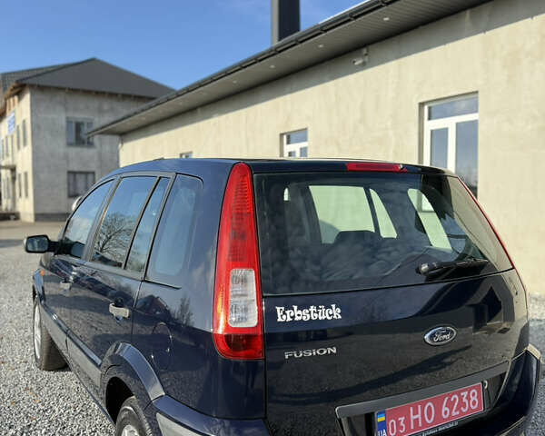 Синій Форд Фьюжен, об'ємом двигуна 1.4 л та пробігом 188 тис. км за 4900 $, фото 14 на Automoto.ua