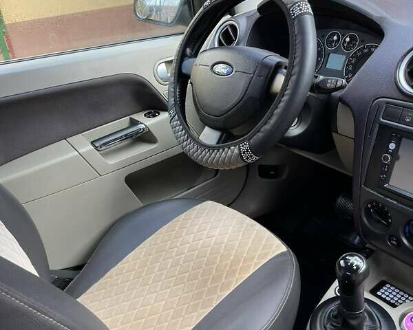 Синий Форд Фьюжн, объемом двигателя 1.39 л и пробегом 303 тыс. км за 5200 $, фото 15 на Automoto.ua