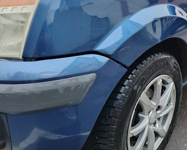 Синий Форд Фьюжн, объемом двигателя 1.39 л и пробегом 318 тыс. км за 3800 $, фото 15 на Automoto.ua