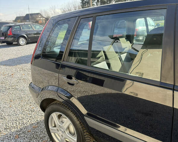 Синій Форд Фьюжен, об'ємом двигуна 1.4 л та пробігом 188 тис. км за 4900 $, фото 65 на Automoto.ua