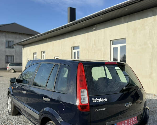 Синій Форд Фьюжен, об'ємом двигуна 1.4 л та пробігом 188 тис. км за 4900 $, фото 13 на Automoto.ua