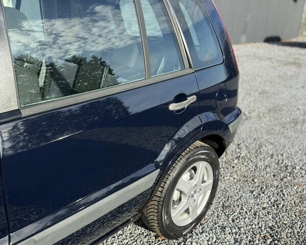 Синій Форд Фьюжен, об'ємом двигуна 1.4 л та пробігом 188 тис. км за 4900 $, фото 63 на Automoto.ua