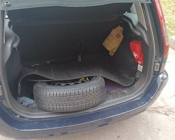 Синій Форд Фьюжен, об'ємом двигуна 1.39 л та пробігом 225 тис. км за 4200 $, фото 9 на Automoto.ua