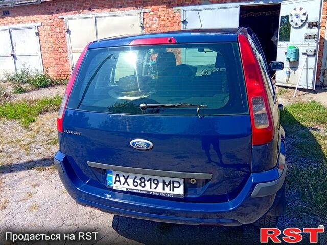 Синий Форд Фьюжн, объемом двигателя 1.6 л и пробегом 280 тыс. км за 5000 $, фото 2 на Automoto.ua