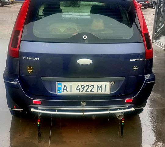 Синий Форд Фьюжн, объемом двигателя 1.4 л и пробегом 200 тыс. км за 4950 $, фото 4 на Automoto.ua