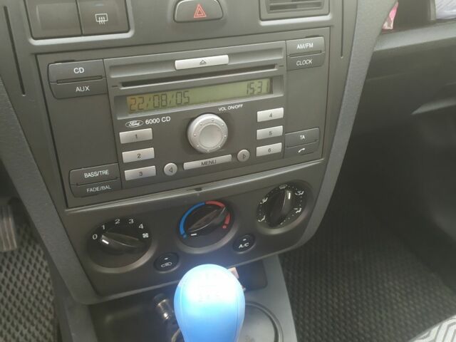 Синий Форд Фьюжн, объемом двигателя 1.4 л и пробегом 250 тыс. км за 3200 $, фото 4 на Automoto.ua