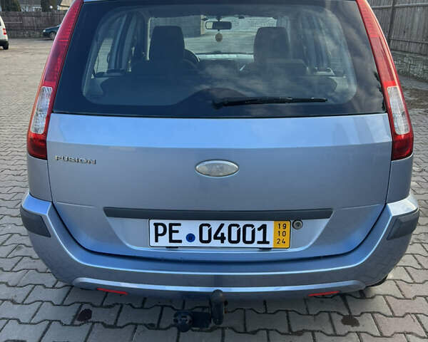 Синій Форд Фьюжен, об'ємом двигуна 1.4 л та пробігом 205 тис. км за 5450 $, фото 4 на Automoto.ua