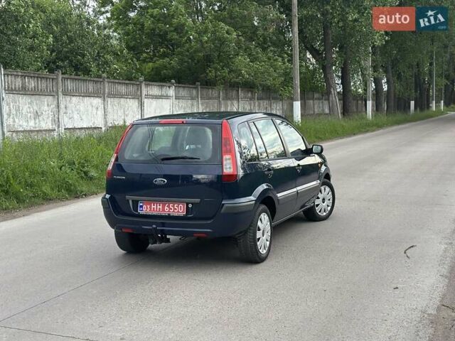 Синій Форд Фьюжен, об'ємом двигуна 1.4 л та пробігом 230 тис. км за 5700 $, фото 10 на Automoto.ua