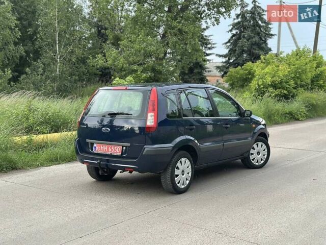 Синій Форд Фьюжен, об'ємом двигуна 1.4 л та пробігом 230 тис. км за 5700 $, фото 6 на Automoto.ua