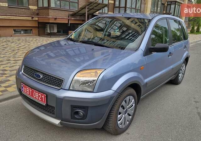 Синий Форд Фьюжн, объемом двигателя 1.4 л и пробегом 200 тыс. км за 5799 $, фото 4 на Automoto.ua