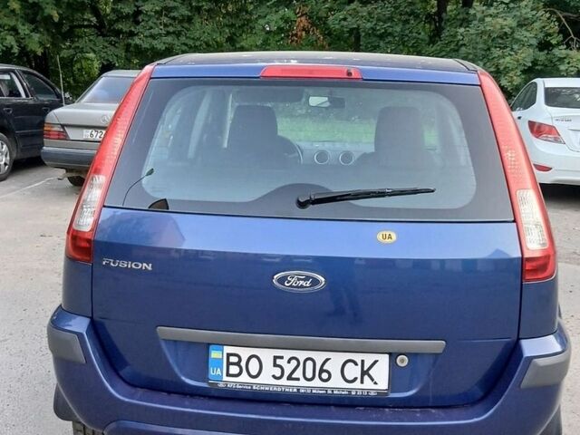 Синій Форд Фьюжен, об'ємом двигуна 1.39 л та пробігом 247 тис. км за 4300 $, фото 8 на Automoto.ua