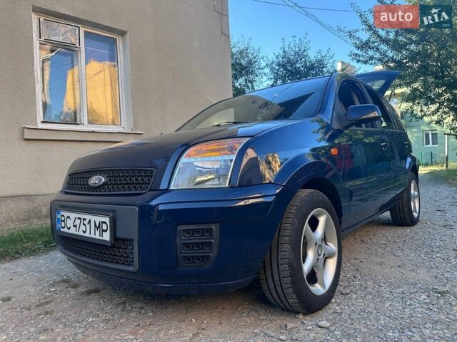 Синий Форд Фьюжн, объемом двигателя 1.39 л и пробегом 230 тыс. км за 5200 $, фото 11 на Automoto.ua