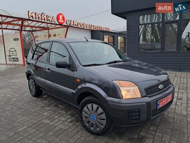 Синий Форд Фьюжн, объемом двигателя 1.4 л и пробегом 186 тыс. км за 5333 $, фото 8 на Automoto.ua