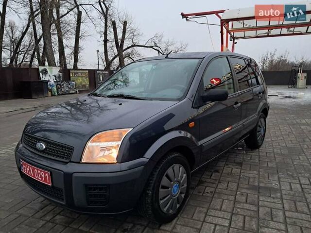 Синий Форд Фьюжн, объемом двигателя 1.4 л и пробегом 186 тыс. км за 5333 $, фото 7 на Automoto.ua