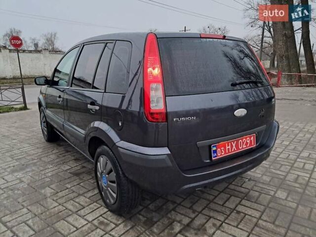 Синий Форд Фьюжн, объемом двигателя 1.4 л и пробегом 186 тыс. км за 5333 $, фото 5 на Automoto.ua