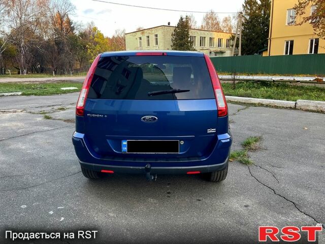 Синий Форд Фьюжн, объемом двигателя 1.6 л и пробегом 179 тыс. км за 5500 $, фото 4 на Automoto.ua