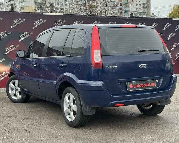 Синий Форд Фьюжн, объемом двигателя 1.39 л и пробегом 160 тыс. км за 4900 $, фото 7 на Automoto.ua