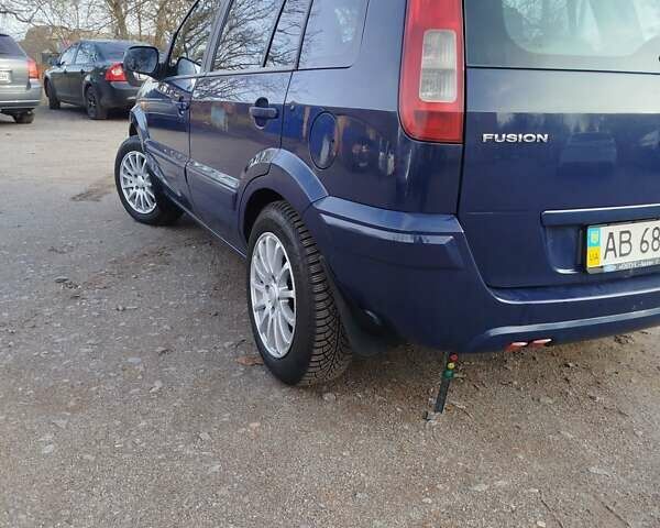 Синій Форд Фьюжен, об'ємом двигуна 1.4 л та пробігом 193 тис. км за 4700 $, фото 9 на Automoto.ua