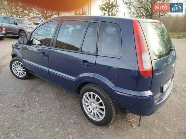 Синій Форд Фьюжен, об'ємом двигуна 1.4 л та пробігом 193 тис. км за 4700 $, фото 10 на Automoto.ua
