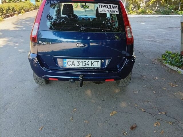 Синий Форд Фьюжн, объемом двигателя 1.4 л и пробегом 160 тыс. км за 5800 $, фото 6 на Automoto.ua