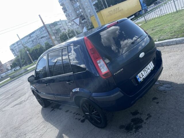 Синий Форд Фьюжн, объемом двигателя 1.2 л и пробегом 191 тыс. км за 4200 $, фото 7 на Automoto.ua
