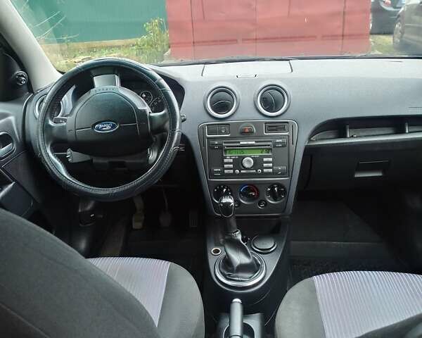 Синій Форд Фьюжен, об'ємом двигуна 1.4 л та пробігом 181 тис. км за 4900 $, фото 11 на Automoto.ua