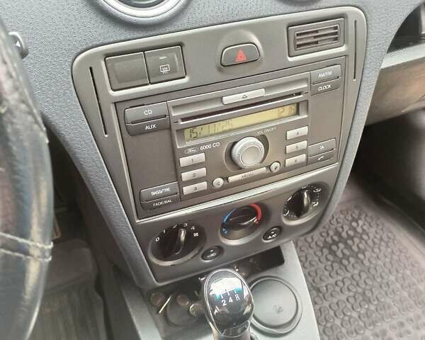 Синій Форд Фьюжен, об'ємом двигуна 1.4 л та пробігом 181 тис. км за 4900 $, фото 12 на Automoto.ua