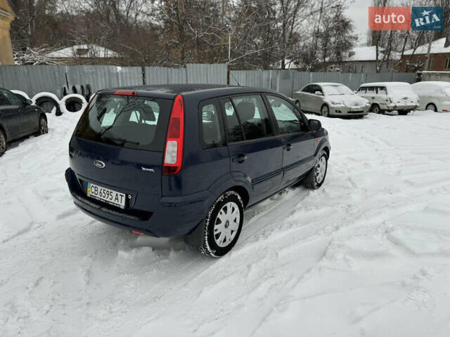 Синій Форд Фьюжен, об'ємом двигуна 1.39 л та пробігом 109 тис. км за 5499 $, фото 6 на Automoto.ua