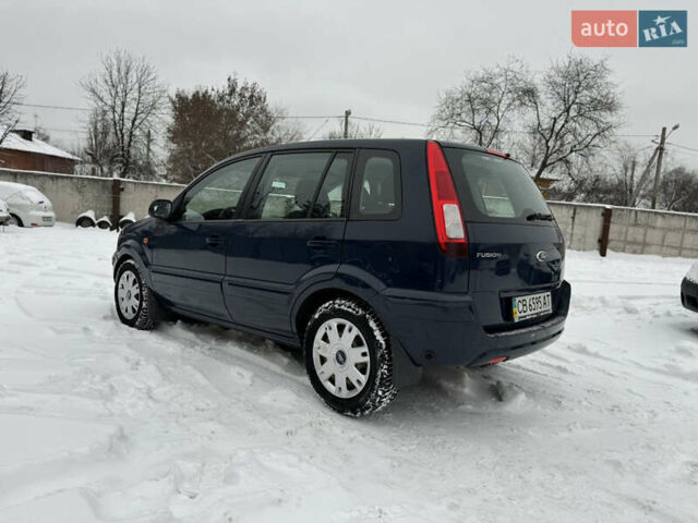 Синій Форд Фьюжен, об'ємом двигуна 1.39 л та пробігом 109 тис. км за 5499 $, фото 5 на Automoto.ua