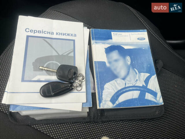 Синий Форд Фьюжн, объемом двигателя 1.4 л и пробегом 164 тыс. км за 5500 $, фото 9 на Automoto.ua
