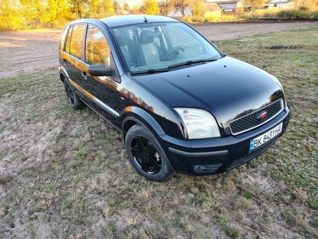 Синій Форд Фьюжен, об'ємом двигуна 1.4 л та пробігом 255 тис. км за 4200 $, фото 1 на Automoto.ua